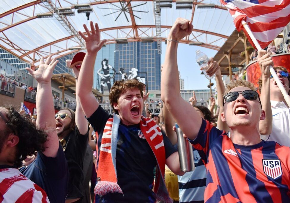 Fans react in June 2022 at Power & Light as news breaks that Kansas City will host during the 2026 World Cup; photos by Channa Steinmetz/Startland News