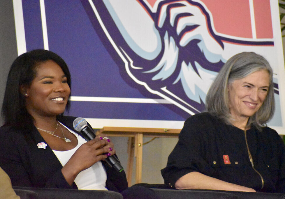 Janá Wagner, division manager for KC BizCare, shares a laugh with Tracy Whelpley, director of regional impact for KC2026, during a panel discussing the FIFA World Cup and small business; photo by Nikki Overfelt Chifalu, Startland News